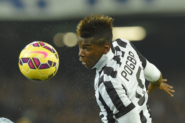 NAPLES, ITALY - JANUARY 11:  Paul Pogba of Juventus in action during the Serie A match between SSC Napoli and Juventus FC at Stadio San Paolo on January 11, 2015 in Naples, Italy.  (Photo by Giuseppe Bellini/Getty Images)