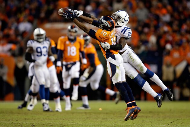 DENVER, CO - JANUARY 11:  Vontae Davis #21 of the Indianapolis Colts breaks up a pass intended for  Emmanuel Sanders #10 of the Denver Broncos during the fourth quarter  during a 2015 AFC Divisional Playoff game at Sports Authority Field at Mile High on January 11, 2015 in Denver, Colorado.  (Photo by Ezra Shaw/Getty Images)