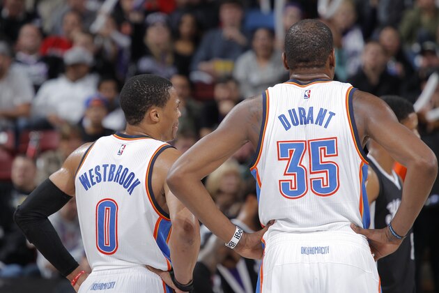 SACRAMENTO, CA - DECEMBER 16: Russell Westbrook #0 and Kevin Durant #35 of the Oklahoma City Thunder look on during the game against the Sacramento Kings on December 16, 2014 at Sleep Train Arena in Sacramento, California. NOTE TO USER: User expressly acknowledges and agrees that, by downloading and or using this photograph, User is consenting to the terms and conditions of the Getty Images Agreement. Mandatory Copyright Notice: Copyright 2014 NBAE (Photo by Rocky Widner/NBAE via Getty Images) SACRAMENTO, CA - DECEMBER 16: Russell Westbrook #0 and Kevin Durant #35 of the Oklahoma City Thunder look on during the game against the Sacramento Kings on December 16, 2014 at Sleep Train Arena in Sacramento, California. NOTE TO USER: User expressly acknowledges and agrees that, by downloading and or using this photograph, User is consenting to the terms and conditions of the Getty Images Agreement. Mandatory Copyright Notice: Copyright 2014 NBAE (Photo by Rocky Widner/NBAE via Getty Images)