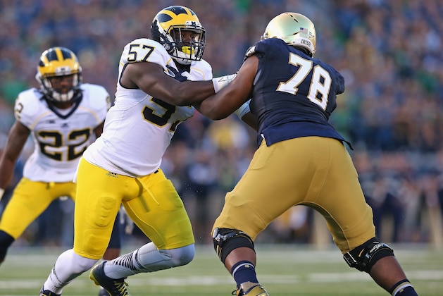 SOUTH BEND, IN - SEPTEMBER 06:  Frank Clark #57 of the Michigan Wolverines rushes against Ronnie Stanley #78 of the Notre Dame Fighting Irish at Notre Dame Stadium on September 6, 2014 in South Bend, Indiana. Notre Dame defeated Michigan 31-0.  (Photo by Jonathan Daniel/Getty Images)
