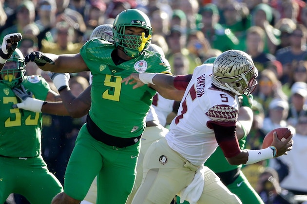 PASADENA, CA - JANUARY 01:  Defensive lineman Arik Armstead #9 of the Oregon Ducks pressures quarterback Jameis Winston #5 of the Florida State Seminoles during the first quarter of the College Football Playoff Semifinal at the Rose Bowl Game presented by Northwestern Mutual at the Rose Bowl on January 1, 2015 in Pasadena, California.  (Photo by Jeff Gross/Getty Images)