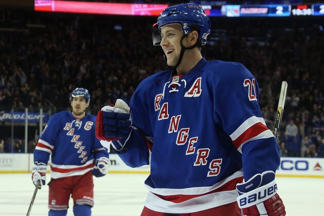 NEW YORK, NY - DECEMBER 01: Derek Stepan #21 of the New York Rangers skates against the Tampa Bay Lightning at Madison Square Garden on December 1, 2014 in New York City. The Lightning defeated the Rangers 6-3.  (Photo by Bruce Bennett/Getty Images)