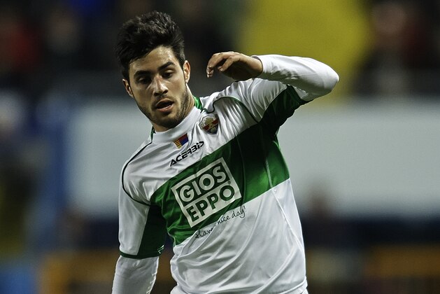 VALENCIA, SPAIN - DECEMBER 13: Carles Gil of Elche FC runs with the ball during the La Liga match between Levante UD and Elche FC at Ciutat de Valencia on December 13, 2013 in Valencia, Spain. (Photo by Manuel Queimadelos Alonso/Getty Images) VALENCIA, SPAIN - DECEMBER 13: Carles Gil of Elche FC runs with the ball during the La Liga match between Levante UD and Elche FC at Ciutat de Valencia on December 13, 2013 in Valencia, Spain. (Photo by Manuel Queimadelos Alonso/Getty Images)