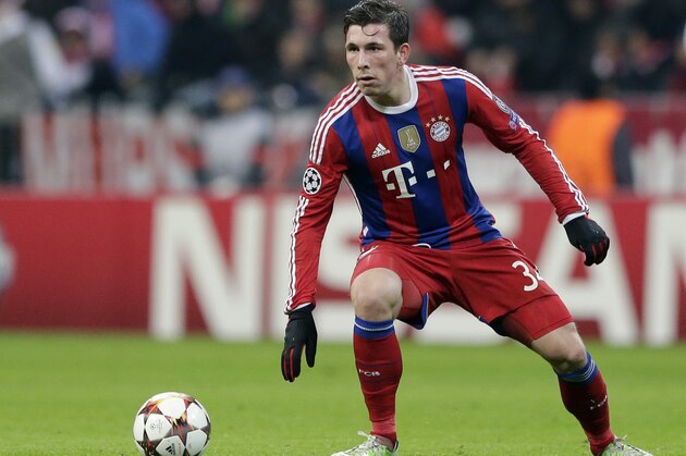 FILE - In this Dec. 10, 2014 file picture Bayern's Pierre-Emile Hojbjerg from Denmark controls the ball during the Champions League group E soccer match between FC Bayern Munich and CSKA Moscow in Munich, Germany. Bayern Munich is giving Denmark defender Pierre-Emile Hojbjerg a three-year contract extension and sending him on loan to Bundesliga rival Augsburg for the rest of this season. Bayern director of sport Matthias Sammer said Thursday Jan. 8, 2015  that the Bundesliga champion will extend the 19-year-old Hojbjerg’s contract until 2018 as a “clear sign that Bayern is counting on him in the future.”   (AP Photo/Matthias Schrader,File)