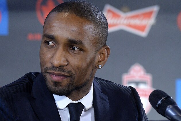 TORONTO, ON - JANUARY 13:  English footballer Jermain Defoe attends a press conference where he was introduced by Toronto FC at Real Sports Bar & Grill on January 13, 2014 in Toronto, Canada.  (Photo by Jag Gundu/Getty Images)