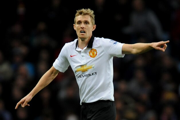 Manchester United's Darren Fletcher during the English Premier League soccer match between Aston Villa and Manchester United at Villa Park, in  Birmingham, England, Saturday, Dec. 20, 2014.  (AP Photo/Rui Vieira)