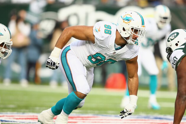 EAST RUTHERFORD, NJ - DECEMBER 01:  Jared Odrick #98 of the Miami Dolphins in action against the New York Jets during their game at MetLife Stadium on December 1, 2013 in East Rutherford, New Jersey.  (Photo by Al Bello/Getty Images)