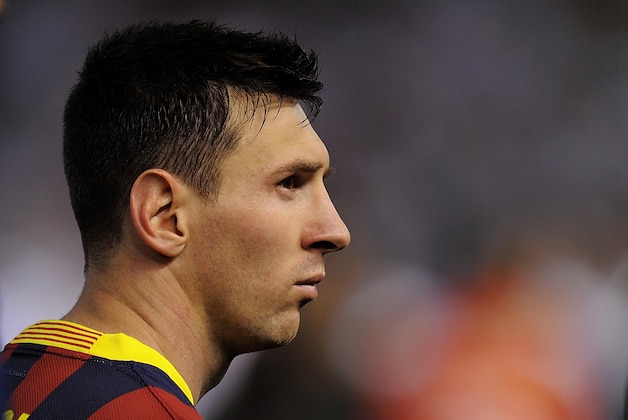 VALENCIA, SPAIN - APRIL 16:  Lionel Messi of FC Barcelona looks on after Barcelona lost to Real Madrid in the Copa del Rey Final at Estadio Mestalla on April 16, 2014 in Valencia, Spain.  (Photo by Denis Doyle/Getty Images)