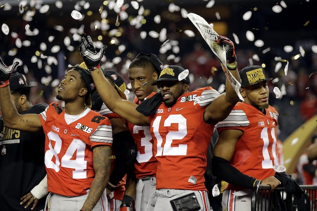 Ohio State players celebrate after the NCAA college football playoff championship game against Oregon Monday, Jan. 12, 2015, in Arlington, Texas. Ohio State won 42-20. (AP Photo/Eric Gay)