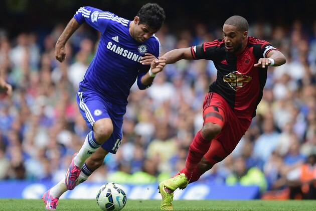 LONDON, ENGLAND - SEPTEMBER 13:  Diego Costa of Chelsea battles with Ashley Williams of Swansea during the Barclays Premier League match between Chelsea and Swansea at Stamford Bridge on September 13, 2014 in London, England.  (Photo by Jamie McDonald/Getty Images)