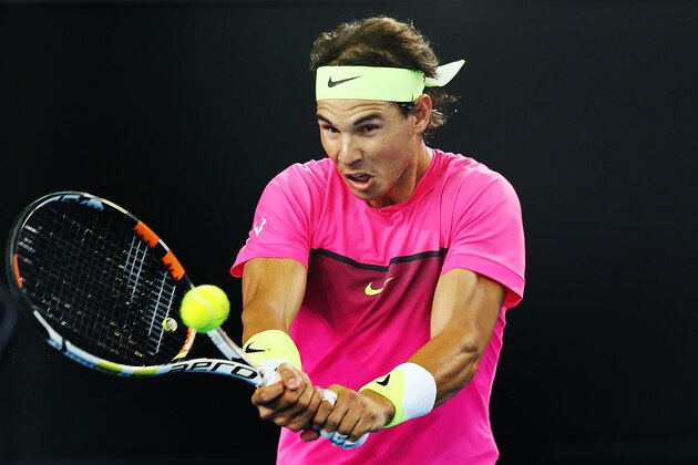 MELBOURNE, AUSTRALIA - JANUARY 14:  Rafael Nadal of Spain hits a backhand in his match against Mark Philippoussis of Australia during Rafa's Summer Set at Melbourne Park on January 14, 2015 in Melbourne, Australia.  (Photo by Michael Dodge/Getty Images)