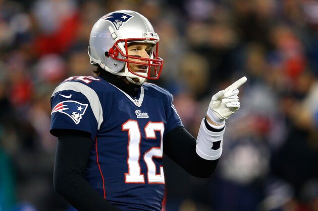FOXBORO, MA - JANUARY 10:  Tom Brady #12 of the New England Patriots looks on in the first half against the Baltimore Ravens during the 2014 AFC Divisional Playoffs game at Gillette Stadium on January 10, 2015 in Foxboro, Massachusetts.  (Photo by Jim Rogash/Getty Images)
