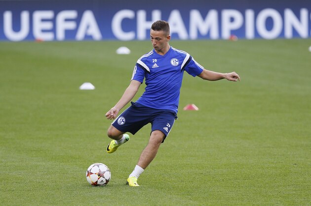 Schalke's Donis Avdijaj kicks the ball during a training session at Stamford Bridge stadium in London Tuesday, Sept. 16, 2014. Chelsea will play Schalke 04 in a Champions League group G soccer match at the stadium on Wednesday. (AP Photo/Kirsty Wigglesworth)