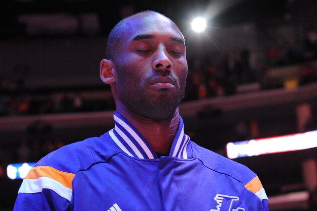 LOS ANGELES, CA - JANUARY 07:  Kobe Bryant #24 of the Los Angeles Lakers stands on the court before the game against the Los Angeles Clippers at STAPLES Center on January 07, 2015 in Los Angeles, California. NOTE TO USER: User expressly acknowledges and agrees that, by downloading and/or using this Photograph, user is consenting to the terms and conditions of the Getty Images License Agreement. Mandatory Copyright Notice: Copyright 2015 NBAE (Photo by Andrew D. Bernstein/NBAE via Getty Images)