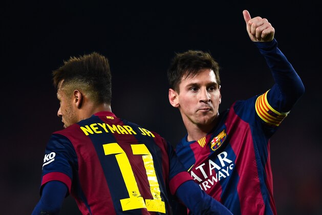 BARCELONA, SPAIN - JANUARY 08:  Lionel Messi of FC Barcelona celebrates with his teamm-ate Neymar of FC Barcelona after scoring his team's third goal during the Copa del Rey Round of 16 First Leg match between FC Barcelona and Elche CF at Camp Nou on January 8, 2015 in Barcelona, Spain.  (Photo by David Ramos/Getty Images)
