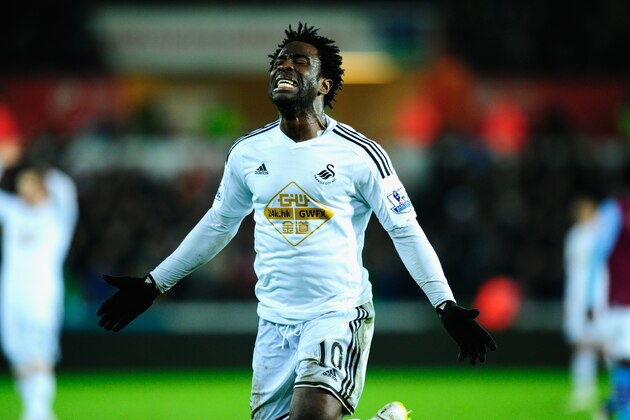 SWANSEA, WALES - DECEMBER 26:  Wilfried Bony of Swansea reacts after having a goal dissalowed during the Barclays Premier League match between Swansea City and Aston Villa at Liberty Stadium on December 26, 2014 in Swansea, Wales.  (Photo by Stu Forster/Getty Images)