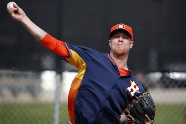 ADVANCE FOR WEEKEND EDITIONS, MARCH 15-16 - FILE - In this Feb. 25, 2014 file photo, Houston Astros pitcher Mike Foltynewicz throws during a spring training baseball workout in Viera, Fla. Foltynewicz is one of the top prospects of the Astros, part of a group expected to turn around this once proud franchise and get fans back to the ballpark after three straight 100-loss seasons.  (AP Photo/Alex Brandon)