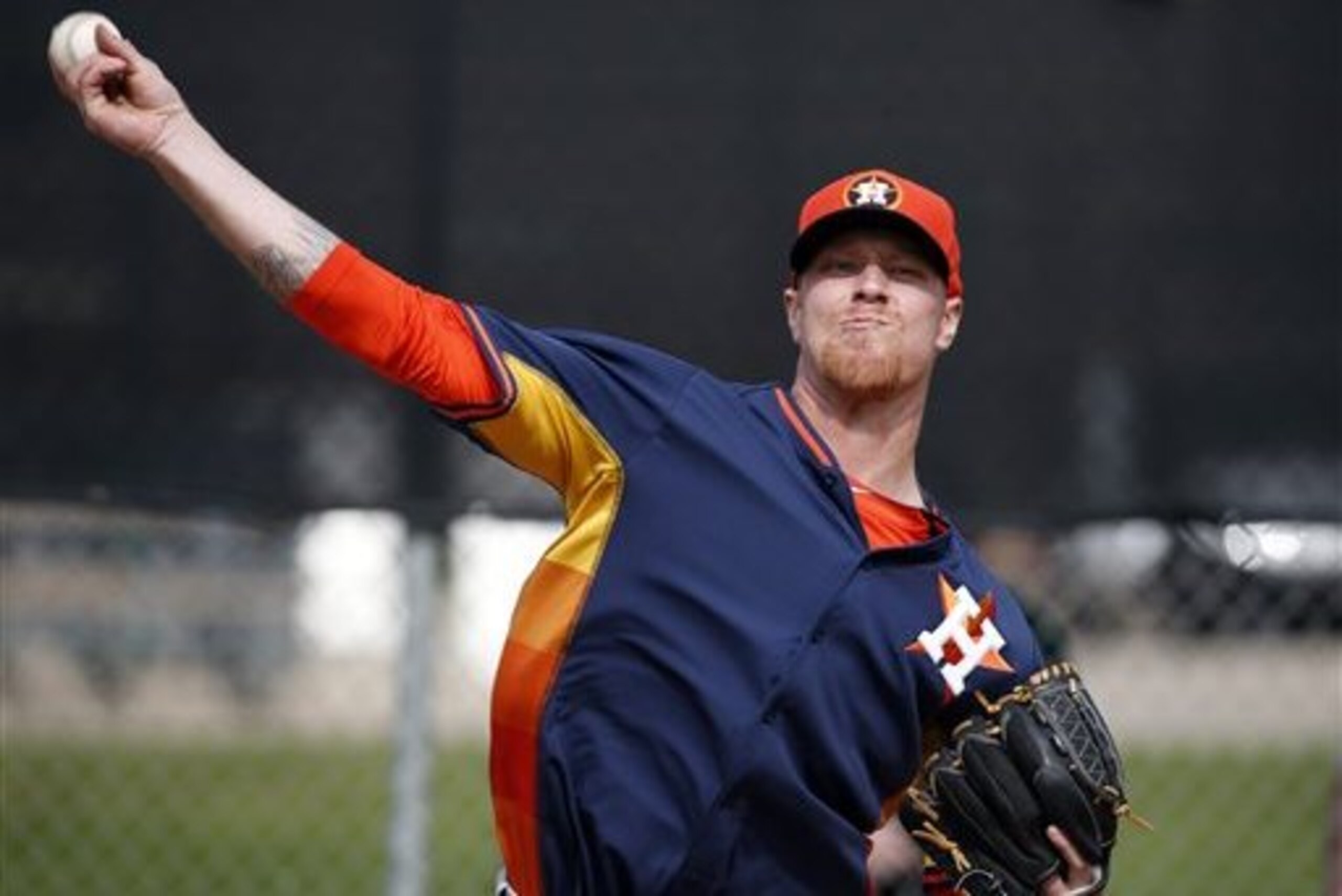 ADVANCE FOR WEEKEND EDITIONS, MARCH 15-16 - FILE - In this Feb. 25, 2014 file photo, Houston Astros pitcher Mike Foltynewicz throws during a spring training baseball workout in Viera, Fla. Foltynewicz is one of the top prospects of the Astros, part of a group expected to turn around this once proud franchise and get fans back to the ballpark after three straight 100-loss seasons.  (AP Photo/Alex Brandon)