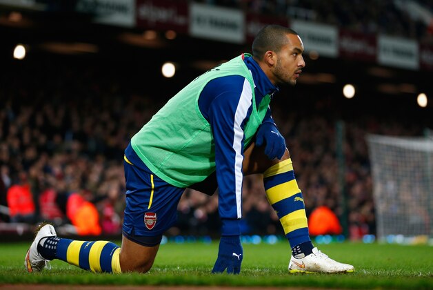 LONDON, ENGLAND - DECEMBER 28:  Theo Walcott of Arsenal warms up during the Barclays Premier League match between West Ham United and Arsenal at Boleyn Ground on December 28, 2014 in London, England.  (Photo by Julian Finney/Getty Images)