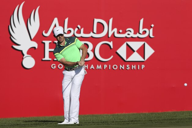 Rory McIlroy of Northern Ireland plays a shot on the 18th hole during the first round of the Abu Dhabi Championship golf tournament in Abu Dhabi, United Arab Emirates, Thursday, Jan. 15, 2015. (AP Photo/Kamran Jebreili)