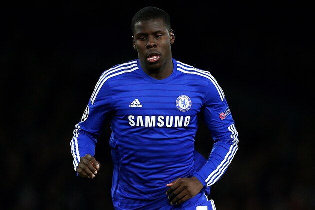 LONDON, ENGLAND - DECEMBER 10:  Kurt Zouma of Chelsea runs with the ball during the UEFA Champions League group G match between Chelsea and Sporting Clube de Portugal at Stamford Bridge on December 10, 2014 in London, United Kingdom.  (Photo by Clive Mason/Getty Images)