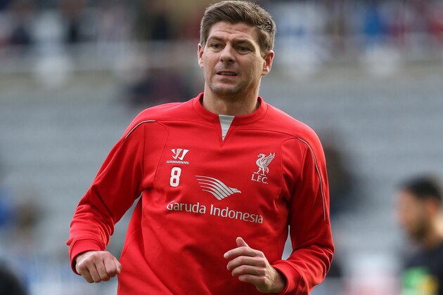 Liverpool's captain Steven Gerrard ahead of their English Premier League soccer match against Newcastle United at St James' Park, Newcastle, England, Saturday, Nov. 1, 2014. (AP Photo/Scott Heppell)