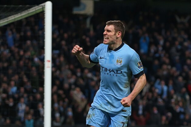 MANCHESTER, ENGLAND - JANUARY 04:  James Milner of Manchester City celebrates after scoring a goal to level the scores at 1-1 during the FA Cup Third Round match between  Manchester City and Sheffield Wednesday at Etihad Stadium on January 4, 2015 in Manchester, England.  (Photo by Jan Kruger/Getty Images)