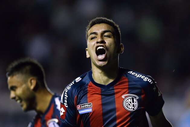 Argentina's San Lorenzo Angel Correa celebrates his goal against Ecuador's Independiente del Valle at a Copa Libertadores soccer match in Buenos Aires, Argentina, Thursday, Feb. 27, 2014. (AP Photo/Victor R. Caivano)