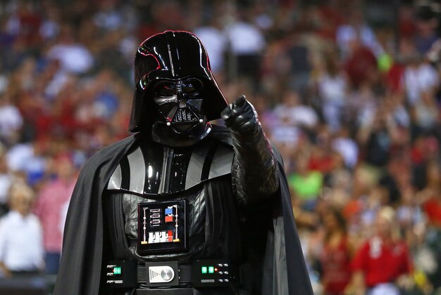 Jun. 23, 2013; Phoenix, AZ, USA: A person dressed as Darth Vader from the movie Star Wars during the game between the Arizona Diamondbacks against the Cincinnati Reds at Chase Field. Mandatory Credit: Mark J. Rebilas-USA TODAY Sports