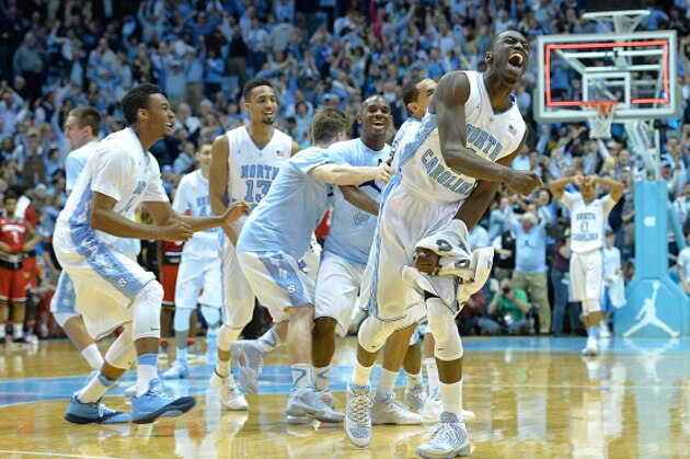 CHAPEL HILL, NC - JANUARY 10:  North Carolina Tar Heels players celebrate after a win against the Louisville Cardinals at the Dean Smith Center on January 10, 2015 in Chapel Hill, North Carolina. North Carolina won 72-71.  (Photo by Grant Halverson/Getty Images)