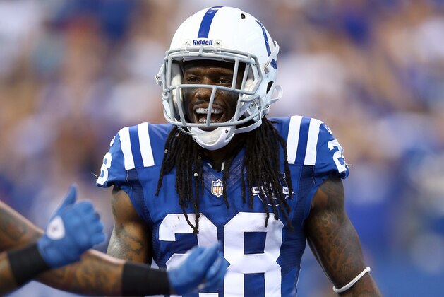 INDIANAPOLIS, IN - SEPTEMBER 08:   Greg Toler #28 celebrates after Antoine Bethea intercepted a pass in the final minutes of the Colts 21-17 win over the Oakland Raiders at Lucas Oil Stadium on September 8, 2013 in Indianapolis, Indiana.  (Photo by Andy Lyons/Getty Images)