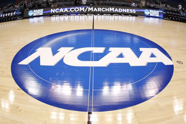 Mar 19, 2014; Orlando, FL, USA; General view of the NCAA logo on the court during practice before the second round of the 2014 NCAA Tournament at Amway Center. Mandatory Credit: Kim Klement-USA TODAY Sports