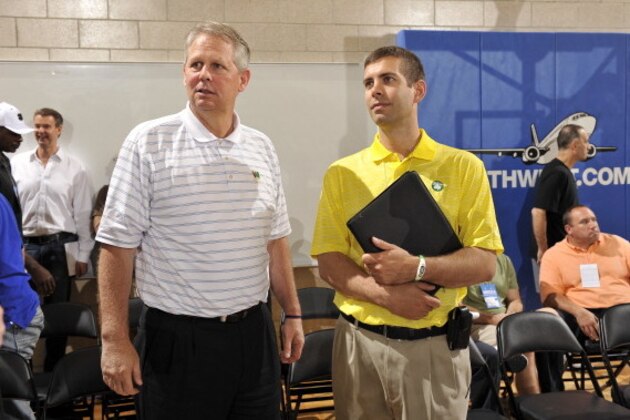 ORLANDO, FL - JULY 8:  New coach of Boston Celtics Brad Stevens (R) confers with Daniel Ray 'Danny' Ainge, basketball executive, President of Basketball Operations for the Boston Celtics (L) during the 2013 Southwest Airlines Orlando Pro Summer League on July 8, 2013 at Amway Center in Orlando, Florida. NOTE TO USER: User expressly acknowledges and agrees that, by downloading and or using this photograph, user is consenting to the terms and conditions of the Getty Images License Agreement. Mandatory Copyright Notice: Copyright 2013 NBAE  (Photo by Fernando Medina/NBAE via Getty Images)