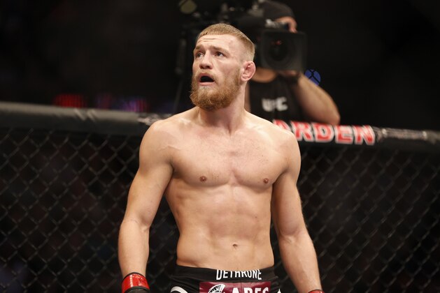 Conor McGregor, of Ireland, is seen against Max Holloway in their UFC on Fox Sports 1 mixed martial arts bout in Boston, Saturday, August 17,2013. McGregor won via unanimous decision. (AP Photo/Gregory Payan)
