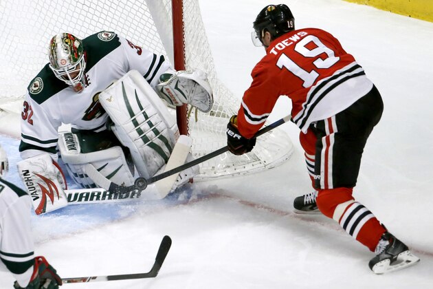 Minnesota Wild goalie Niklas Backstrom makes a save on a shot by Chicago Blackhawks center Jonathan Toews (19) during the second period of an NHL hockey game Tuesday, Dec. 16, 2014, in Chicago. (AP Photo/Charles Rex Arbogast) Minnesota Wild goalie Niklas Backstrom makes a save on a shot by Chicago Blackhawks center Jonathan Toews (19) during the second period of an NHL hockey game Tuesday, Dec. 16, 2014, in Chicago. (AP Photo/Charles Rex Arbogast)