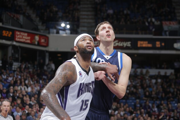 SACRAMENTO, CA -  JANUARY 13: DeMarcus Cousins #15 of the Sacramento Kings defends the basket against Dirk Nowitzki #41 of the Dallas Mavericks during the game on January 13, 2015 at Sleep Train Arena in Sacramento, California . NOTE TO USER: User expressly acknowledges and agrees that, by downloading and or using this Photograph, user is consenting to the terms and conditions of the Getty Images License Agreement. Mandatory Copyright Notice: Copyright 2015 NBAE (Photo by Rocky Widner/NBAE via Getty Images)