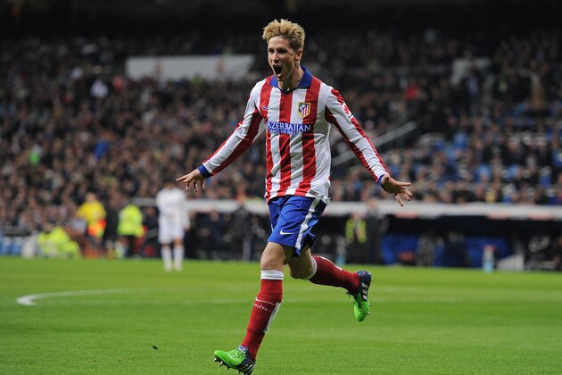 MADRID, SPAIN - JANUARY 15: Fernando Torres of Atletico de Madrid celebrates after scoring Atletico's opening goal during the Copa del Rey Round of 16, Second leg match between Real Madrid and Atletico de Madrid at Estadio Santiago Bernabeu on January 15, 2015 in Madrid, Spain.  (Photo by Denis Doyle/Getty Images)