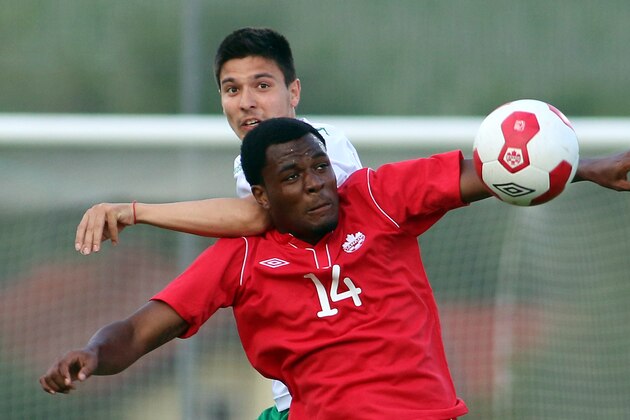 Canada's Cyle Larin, front, challenges for a ball with Ilia Milanov, back, of Bulgaria during a friendly soccer match between Canada and Bulgaria, in Ritzing, Austria, Friday, May 23, 2014. (AP Photo/Ronald Zak) Canada's Cyle Larin, front, challenges for a ball with Ilia Milanov, back, of Bulgaria during a friendly soccer match between Canada and Bulgaria, in Ritzing, Austria, Friday, May 23, 2014. (AP Photo/Ronald Zak)