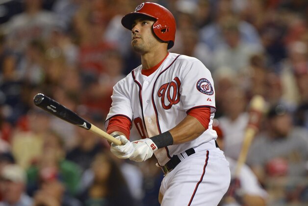 Jun 3, 2014; Washington, DC, USA; Washington Nationals shortstop Ian Desmond (20) hits a solo home run during the sixth inning against the Philadelphia Phillies at Nationals Park. Washington Nationals defeated Philadelphia Phillies 7-0. Mandatory Credit: Tommy Gilligan-USA TODAY Sports