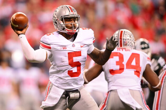 Dec 7, 2013; Indianapolis, IN, USA; Ohio State Buckeyes quarterback Braxton Miller (5) throws a pass during the third quarter of the 2013 Big 10 Championship game against the Michigan State Spartans at Lucas Oil Stadium. Mandatory Credit: Andrew Weber-USA TODAY Sports