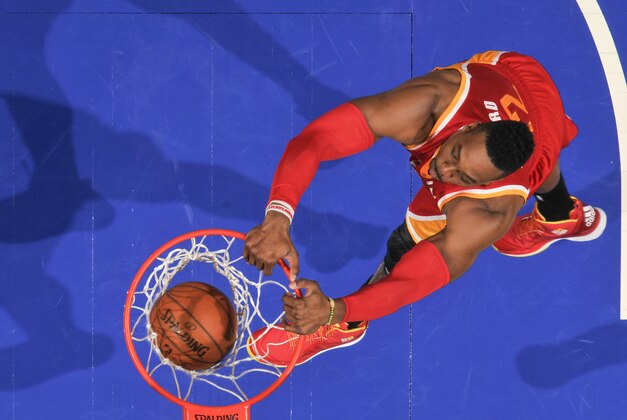 ORLANDO, FL - JANUARY 14:  Dwight Howard #12 of the Houston Rockets dunks against the Orlando Magic during the game on January 14, 2015 at Amway Center in Orlando, Florida. NOTE TO USER: User expressly acknowledges and agrees that, by downloading and or using this photograph, User is consenting to the terms and conditions of the Getty Images License Agreement. Mandatory Copyright Notice: Copyright 2014 NBAE (Photo by Fernando Medina/NBAE via Getty Images)