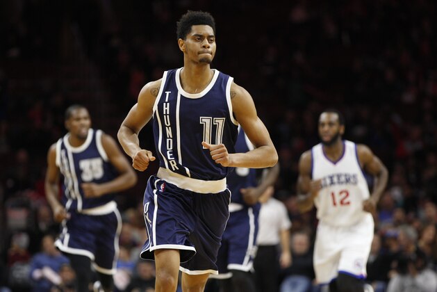 Oklahoma City Thunder guard Jeremy Lamb (11) in action during the second half of an NBA basketball game against the Philadelphia 76ers, Friday, Dec. 5, 2014, in Philadelphia. The Thunder won 103-91. (AP Photo/Chris Szagola)