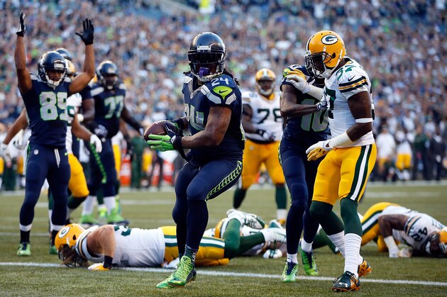 SEATTLE, WA - SEPTEMBER 04: Running back Marshawn Lynch #24 of the Seattle Seahawks scores a touchdown during the second quarter of the game against the Green Bay Packers at CenturyLink Field on September 4, 2014 in Seattle, Washington.  (Photo by Otto Greule Jr/Getty Images)