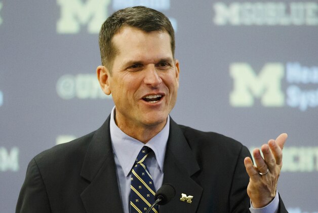 Dec 30, 2014; Ann Arbor, MI, USA; Jim Harbaugh speaks to the media as he is introduced as the new head football coach of the Michigan Wolverines at Jonge Center. Mandatory Credit: Rick Osentoski-USA TODAY Sports