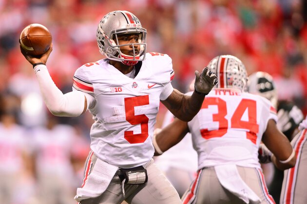 Dec 7, 2013; Indianapolis, IN, USA; Ohio State Buckeyes quarterback Braxton Miller (5) throws a pass during the third quarter of the 2013 Big 10 Championship game against the Michigan State Spartans at Lucas Oil Stadium. Mandatory Credit: Andrew Weber-USA TODAY Sports