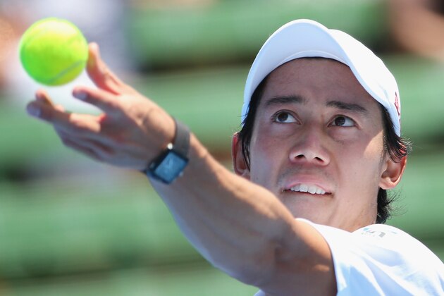 MELBOURNE, AUSTRALIA - JANUARY 16:  Kei Nishikori of Japan serves during his third & fourth place play-off match against Richard Gasquet of France during day four of the Priceline Pharmacy Classic at Kooyong on January 16, 2015 in Melbourne, Australia.  (Photo by Scott Barbour/Getty Images)