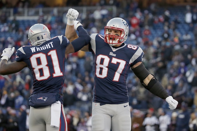 New England Patriots tight end Timothy Wright (81) with New England Patriots tight end Rob Gronkowski (87) before an NFL divisional playoff football game against the Baltimore Ravens Saturday, Jan. 10, 2015, in Foxborough, Mass. (AP Photo/Elise Amendola)