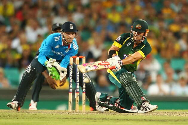 SYDNEY, AUSTRALIA - JANUARY 16: David Warner of Australia plays sweep shoot to bring up his century during the One Day International series match between Australia and England at Sydney Cricket Ground on January 16, 2015 in Sydney, Australia.  (Photo by Mark Nolan/Getty Images)