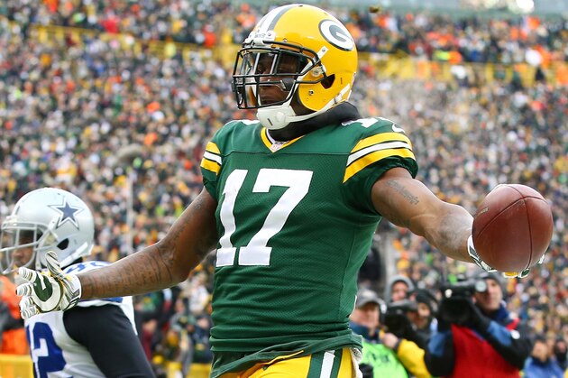 GREEN BAY, WI - JANUARY 11:   Davante Adams #17 of the Green Bay Packers reacts after scoring a touchdown in the third quarter against the Dallas Cowboys during the 2015 NFC Divisional Playoff game at Lambeau Field on January 11, 2015 in Green Bay, Wisconsin.  (Photo by Al Bello/Getty Images)