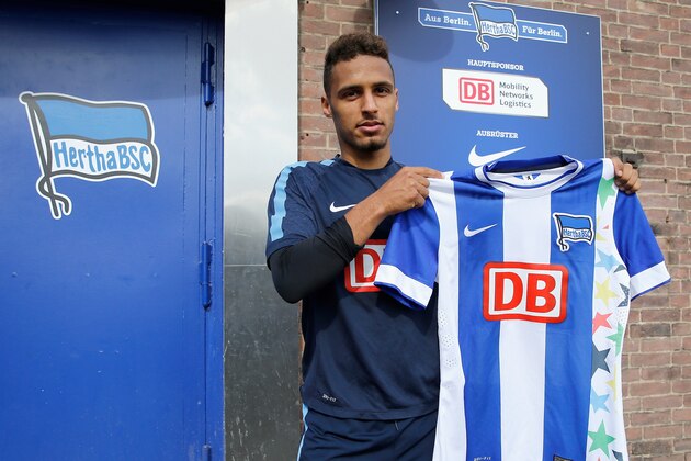 BERLIN, GERMANY - SEPTEMBER 23:  Hany Mukhtar of Hertha BSC presents a special designed jersey on occasion of the world biggest school competition JUGEND TTRAINIERT FUER OLYMPIA prior to the press conference at Hertha office on September 23, 2014 in Berlin, Germany.  (Photo by Boris Streubel/Getty Images for Deutsche Bahn)